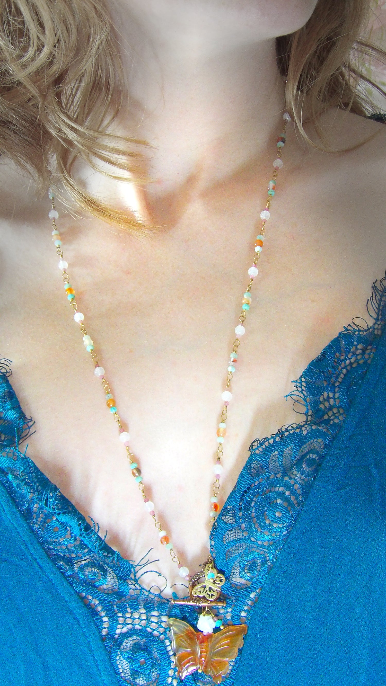 mixed gemstone beaded necklace with carnelian butterfly pendant