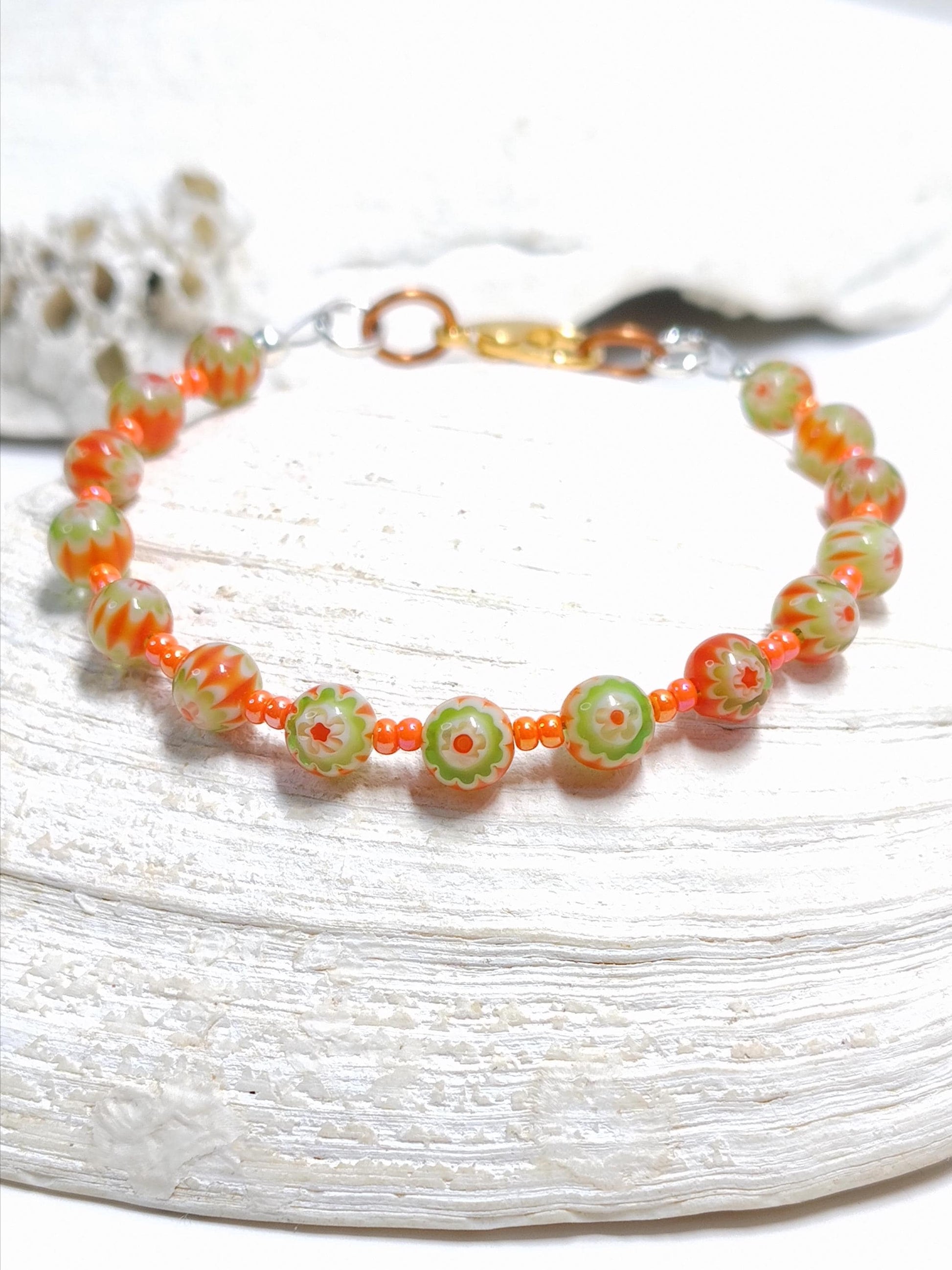 orange and green millefiori glass beaded bracelet in bohemian style accented by orange czech glass seed beads