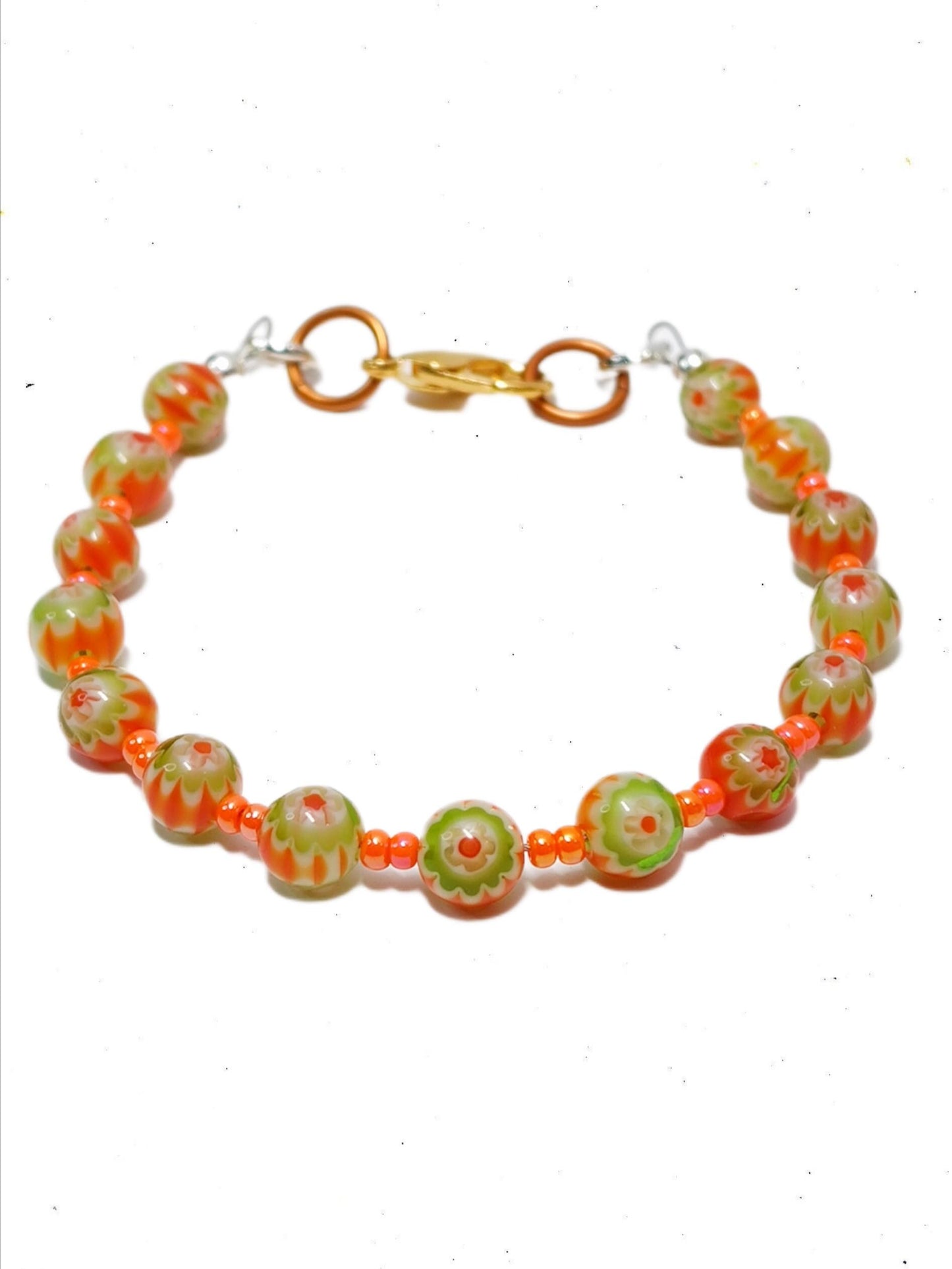 orange and green millefiori glass beaded bracelet in bohemian style accented by orange czech glass seed beads