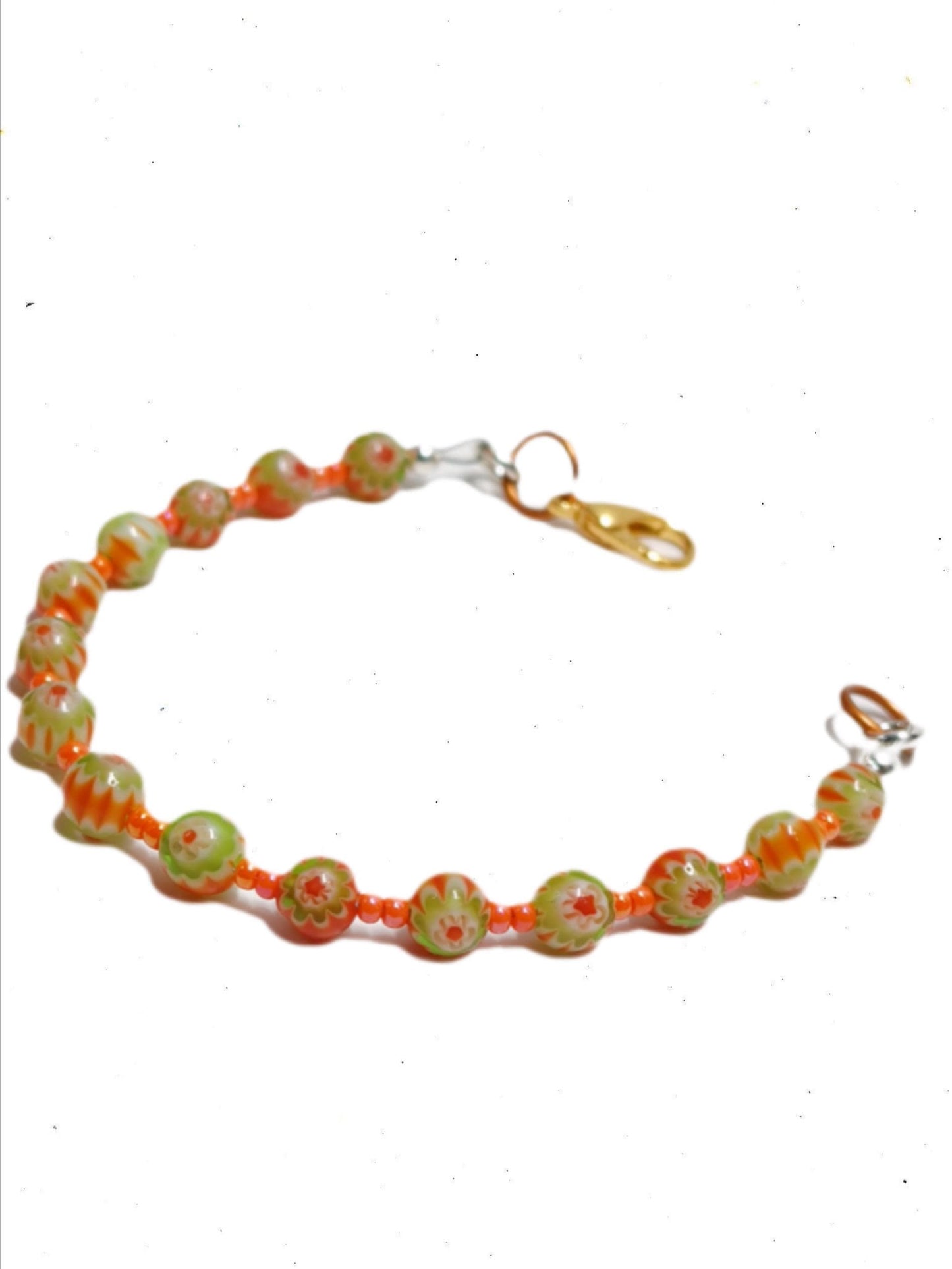 orange and green millefiori glass beaded bracelet in bohemian style accented by orange czech glass seed beads