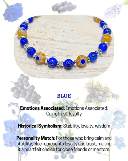 blue and yellow mosaic glass bracelet made with floral millefiori and star place spacer beads in a bohemian style.