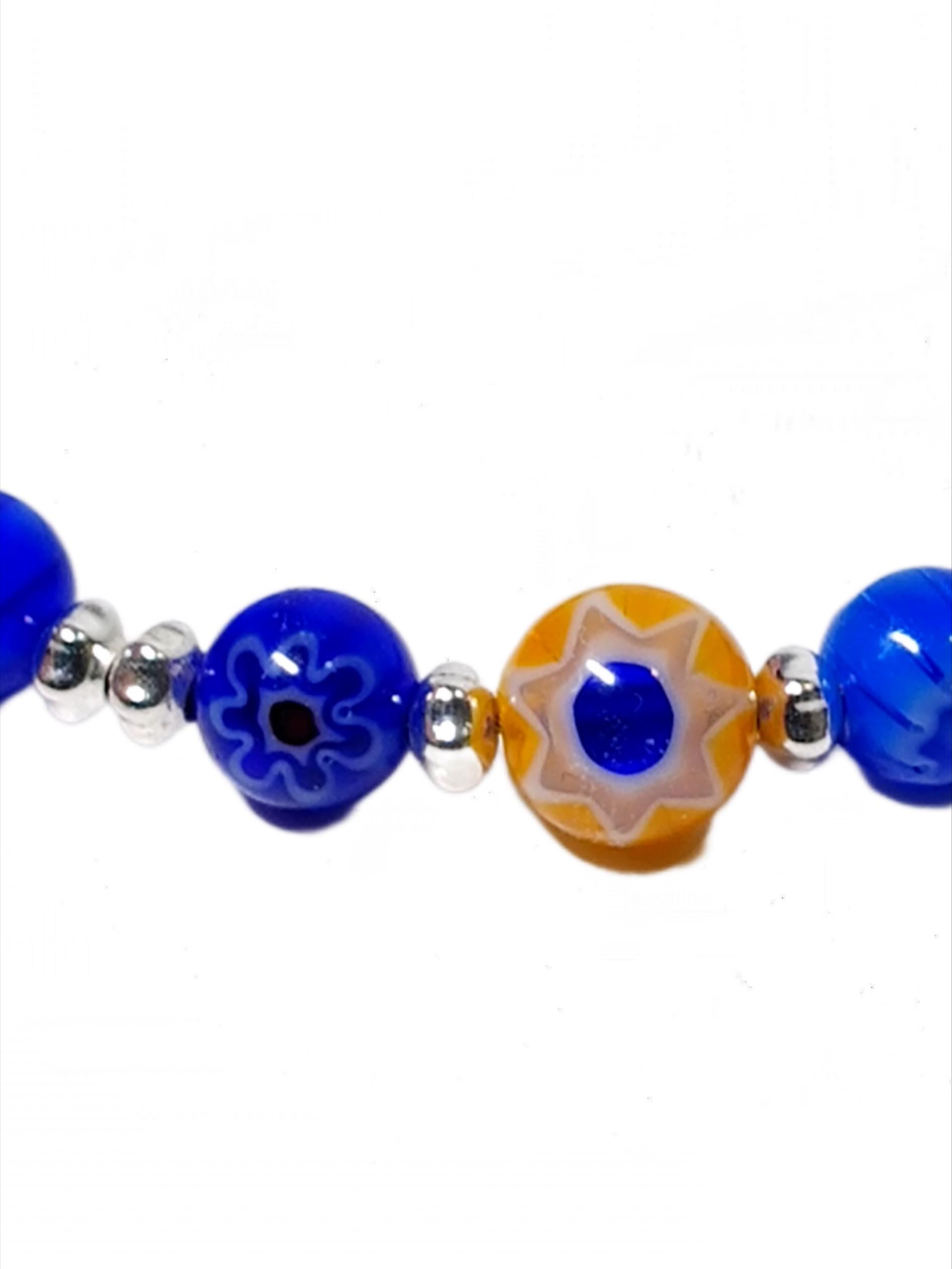 close up of mosaic millefiori glass beads