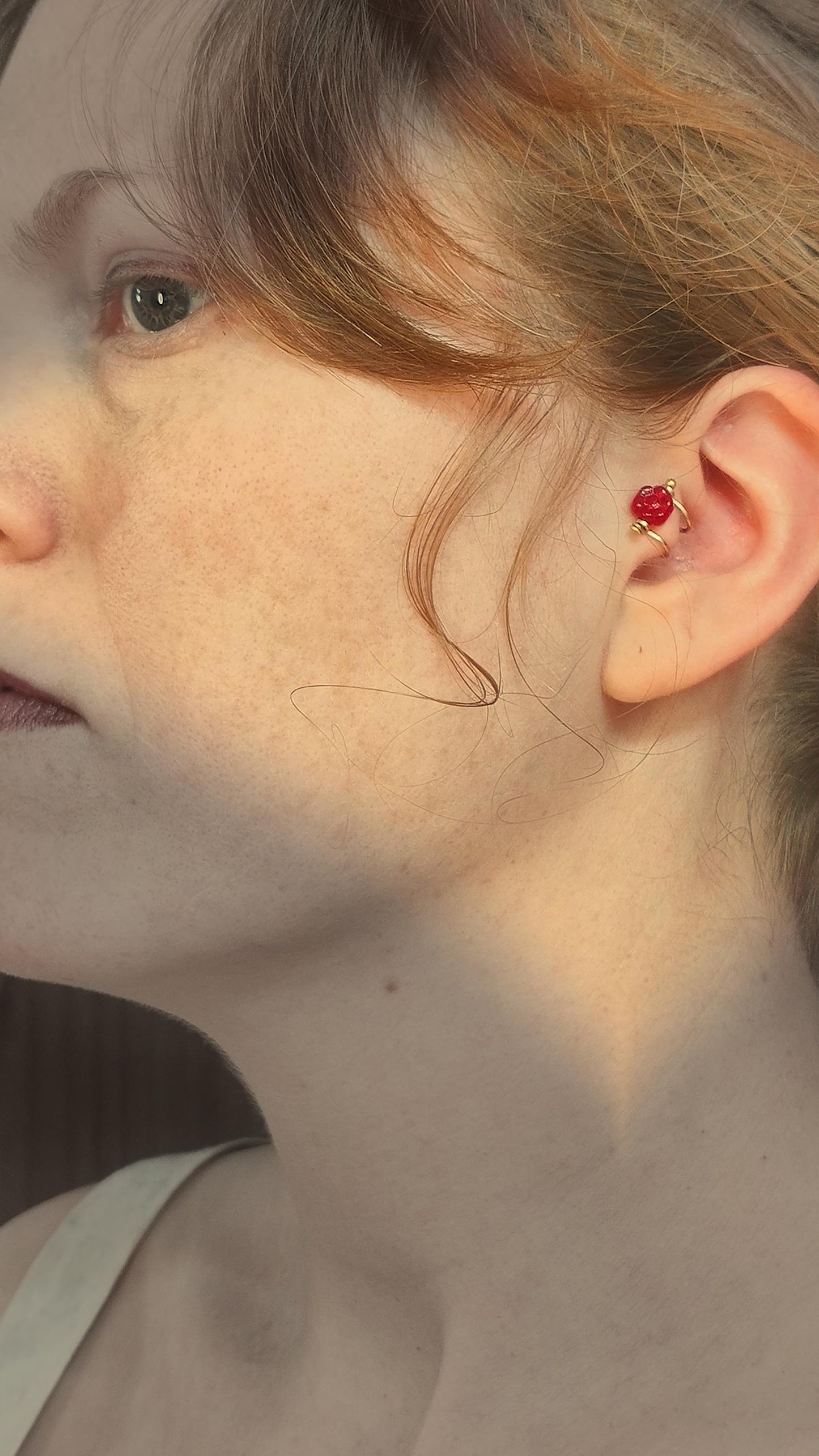Flower ear cuff with bronze frame and red Czech glass flower bead. Wildflower inspired boho jewelry. No piercing ear cuff for women