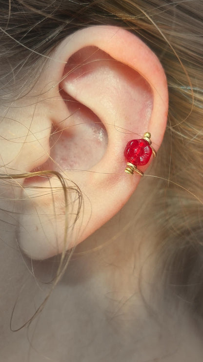 Flower ear cuff with bronze frame and red Czech glass flower bead. Wildflower inspired boho jewelry. No piercing ear cuff for women