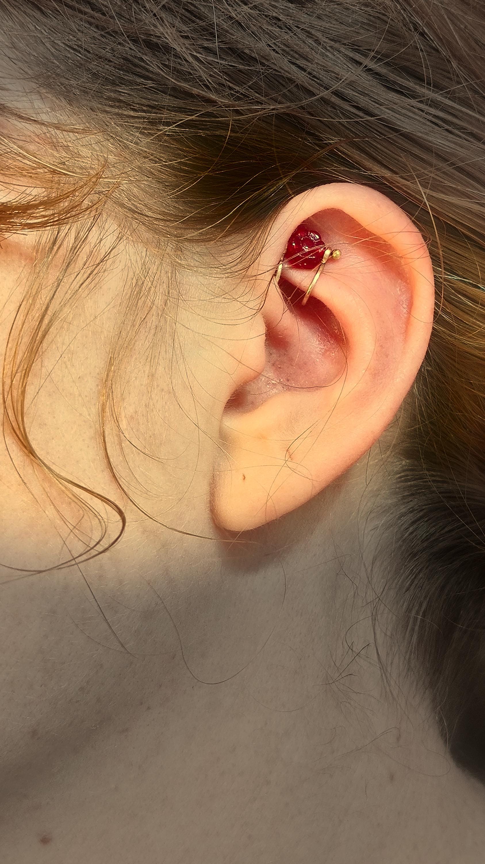 Flower ear cuff with bronze frame and red Czech glass flower bead. Wildflower inspired boho jewelry. No piercing ear cuff for women