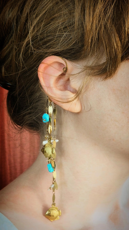 Ocean Wrap Around Earring With Natural Turquoise, pearls and citrine. Adorned with brass sequin chains and fish charms to create a siren style beachy ear cuff.