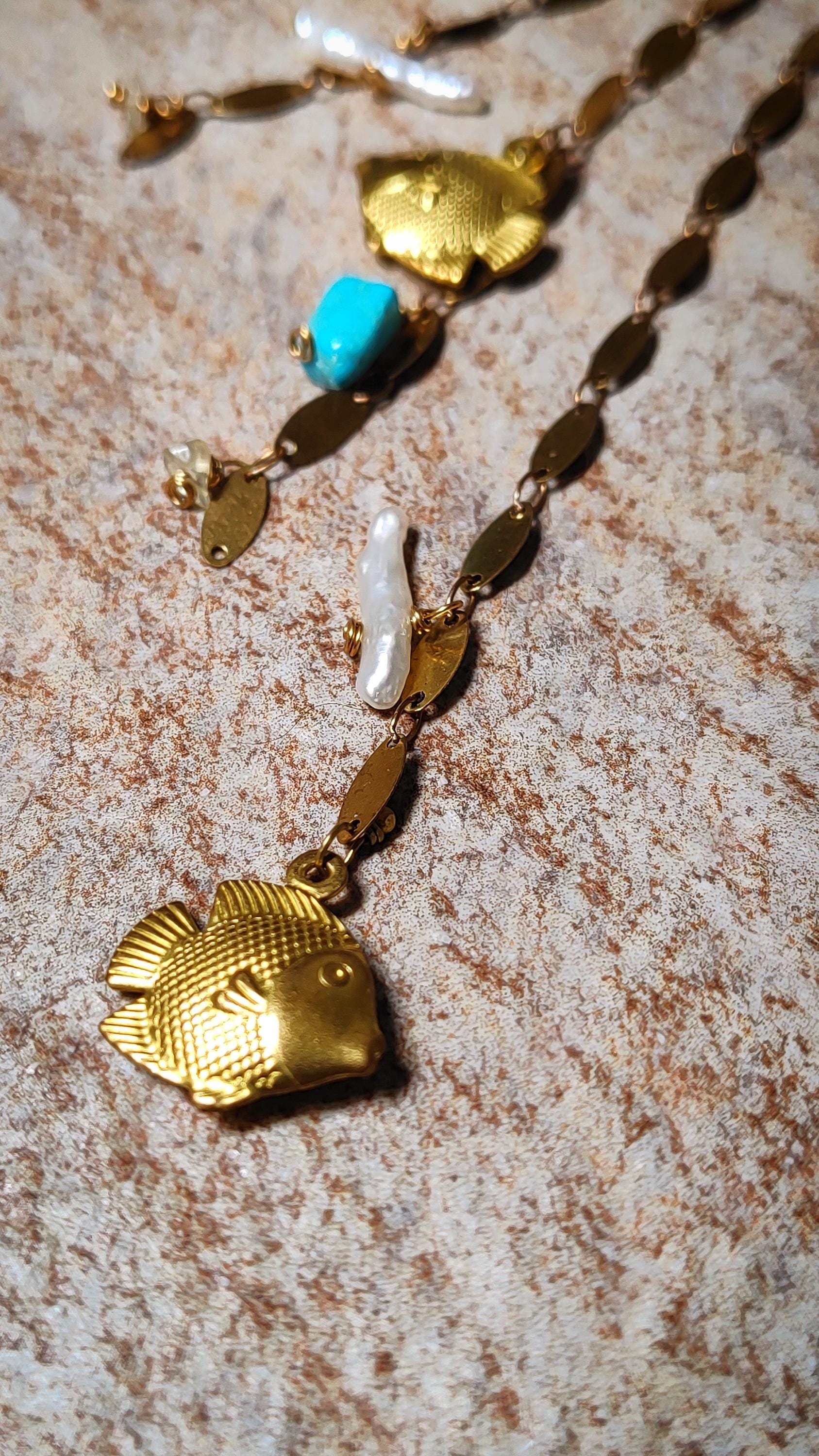 Ocean Wrap Around Earring With Natural Turquoise, pearls and citrine. Adorned with brass sequin chains and fish charms to create a siren style beachy ear cuff.