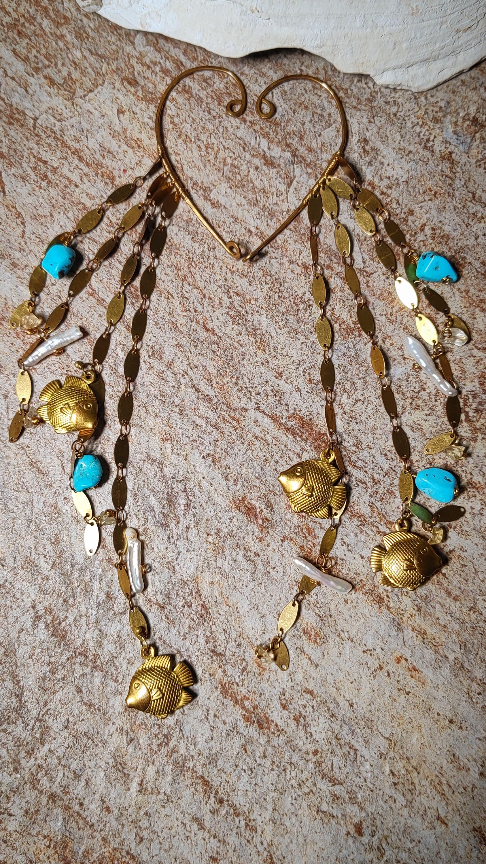 Ocean Wrap Around Earring With Natural Turquoise, pearls and citrine. Adorned with brass sequin chains and fish charms to create a siren style beachy ear cuff.