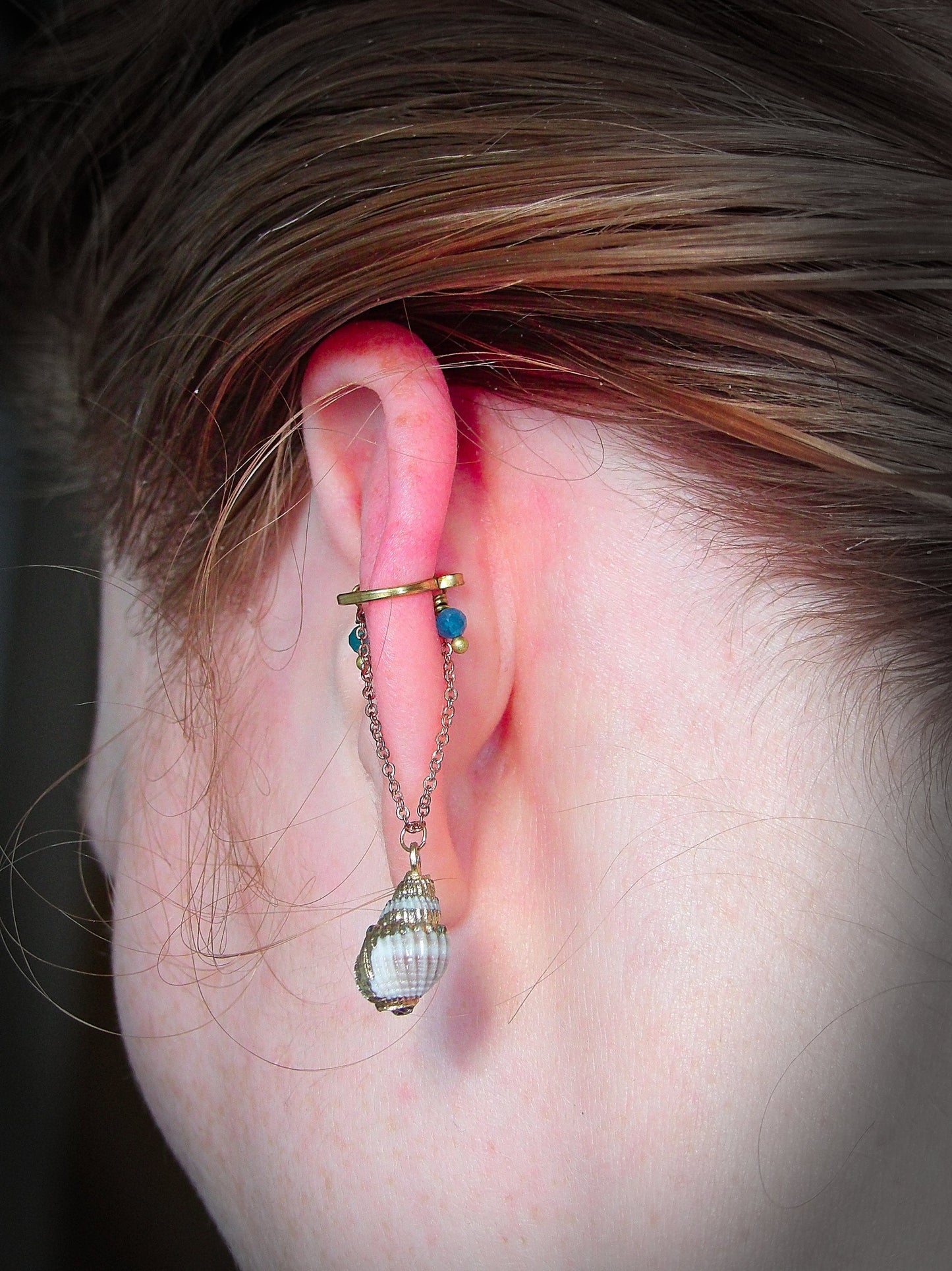 ethically sourced blue apatite ear cuff with sea shell