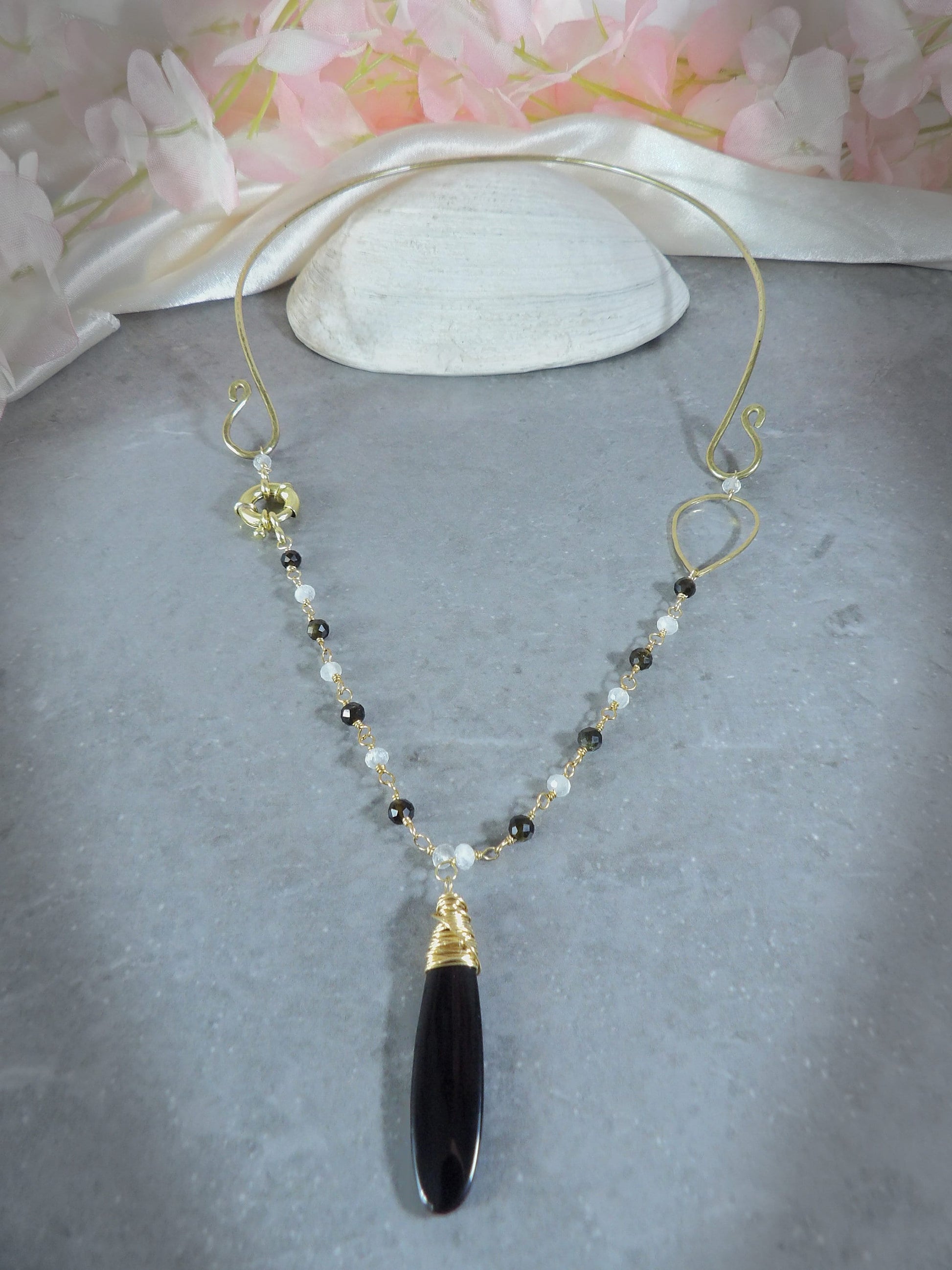 Hammered brass obsidian & moonstone torque necklace
