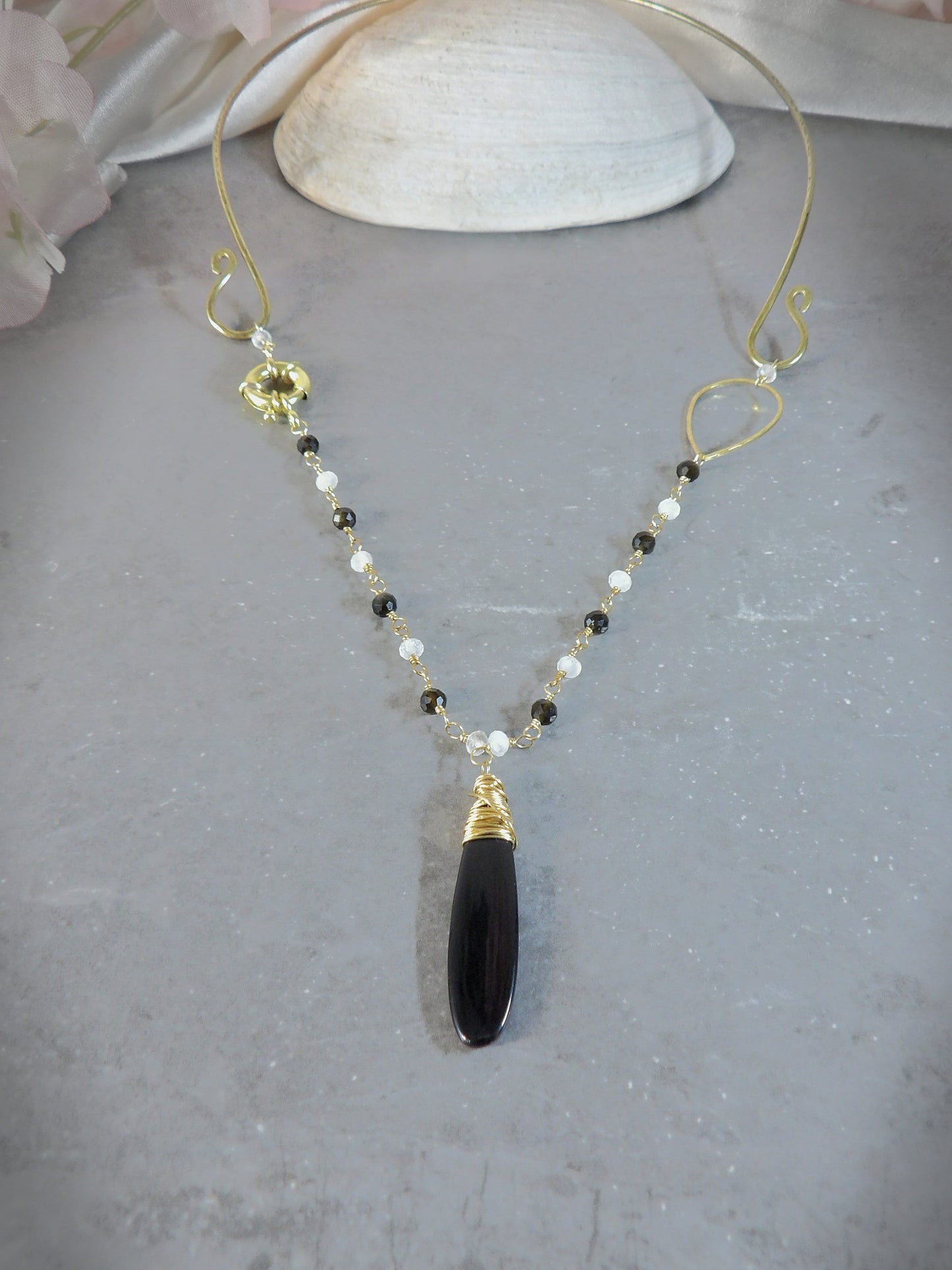 Hammered brass obsidian & moonstone torque necklace
